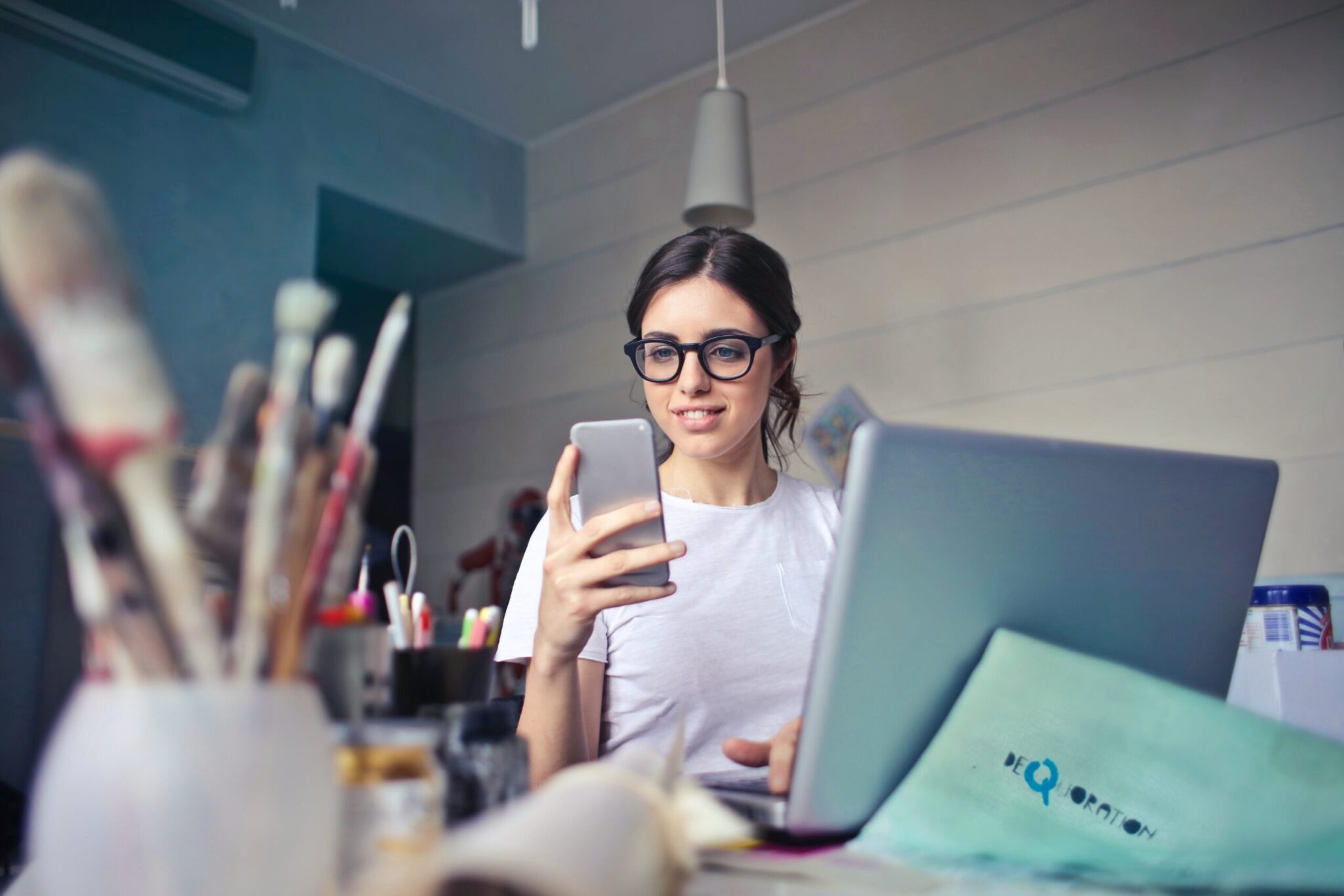 woman checking her approval for an llc business loan