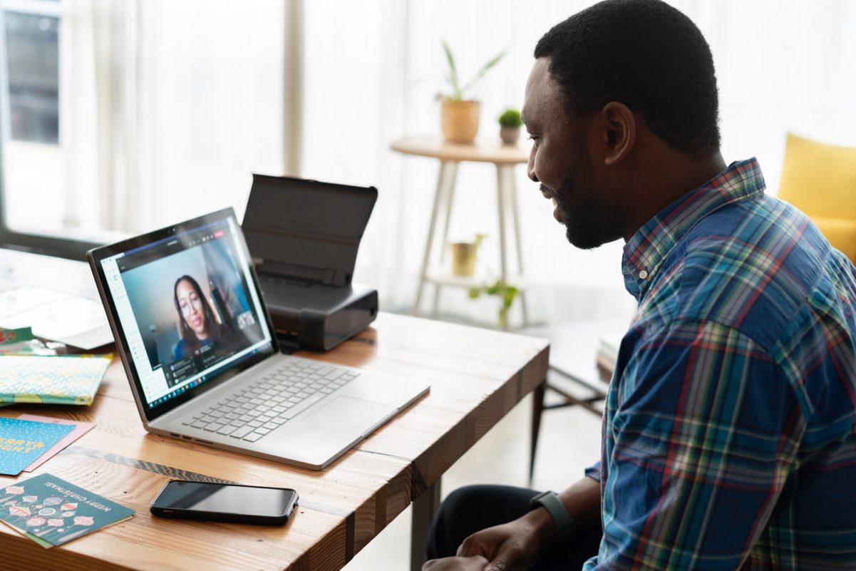 Client talking to freelancer on zoom for hiring interview