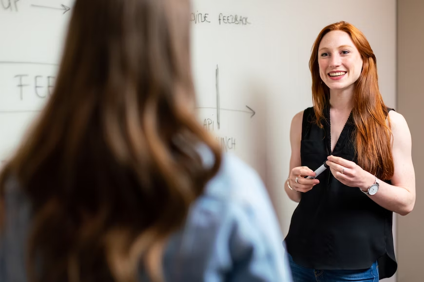 woman talking to another woman