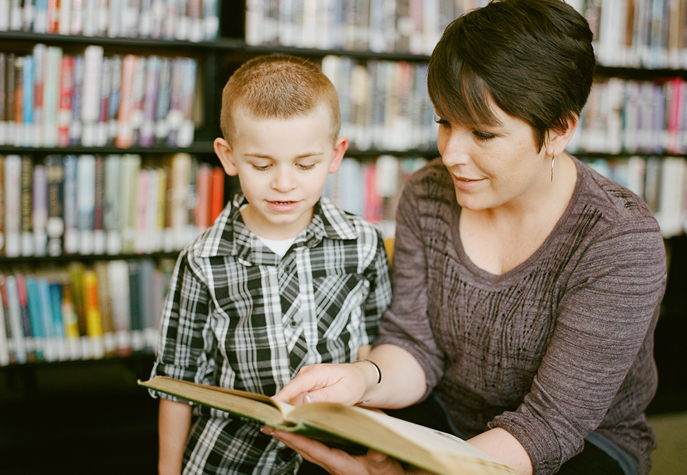 woman offers tutoring to small boy as side job for teacher